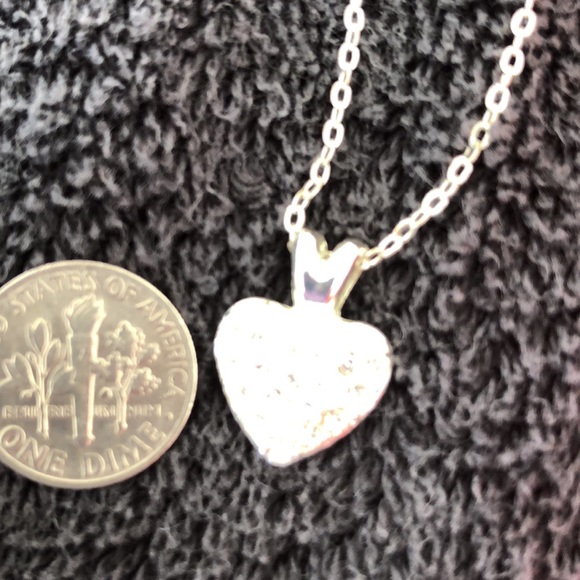 Heart bling dime size w/solid back with slight rub marks on back. Silver color. - Picture 5 of 15